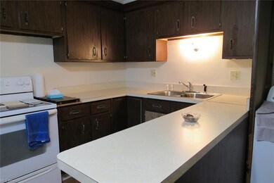 Kitchen offers decent amount of cabinets and count