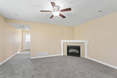 254 N Pointe Ln, Raymore, MO 64083 - photo 5