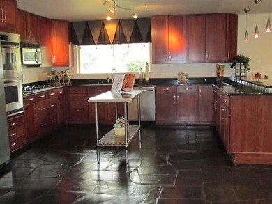 Kitchen. Large gourmet kitchen with granite, stain