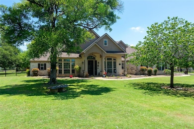 View of front of house featuring a front lawn