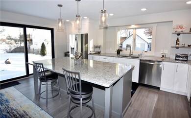 Gorgeous redone kitchen offers ample counter space