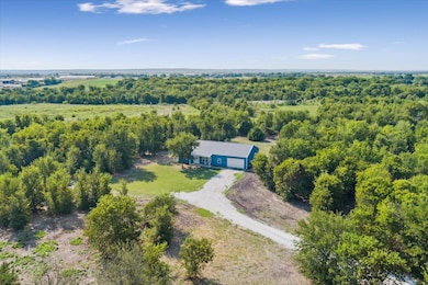 Aerial view of property and surrounding area