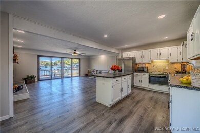 2nd View of Open Floor Plan Flowing From the Kitch