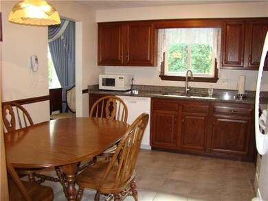 Exterior Front. Beautiful oak kitchen with new gra