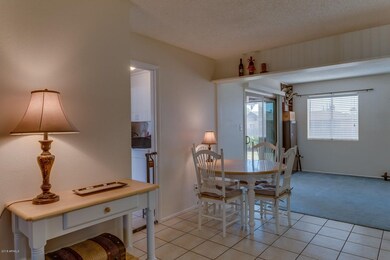 Kitchen leading to Den