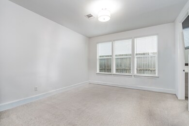 This first floor bedroom boasts a double door entry, huge closet, and ensuite bathroom. Could also be used as an office, home gym or a game room.