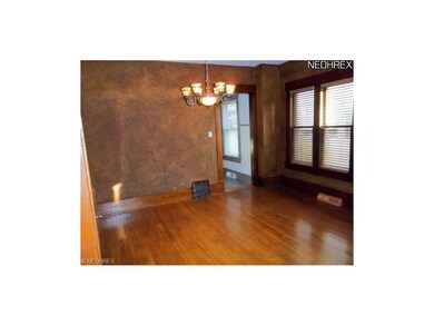 Lower Unit Dining Room w/Hardwood Floors and Wide 