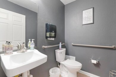 Bathroom with a sink and toilet