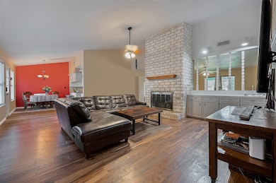 Vaulted ceilings, warm wood floors, and a statemen