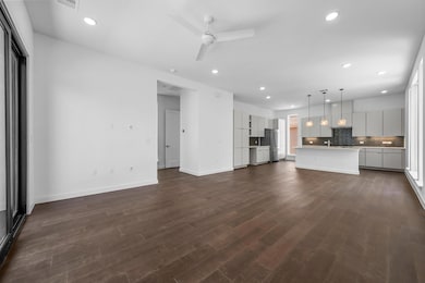 Unfurnished living room featuring recessed lighti