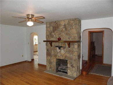 Living Room. Gorgeous Stone Fireplace w/ Gas Logs 