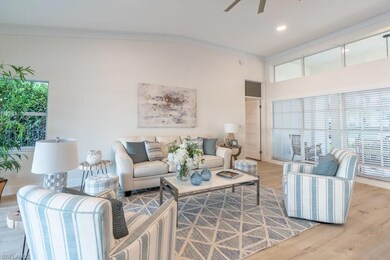 Great room has crown molding, custom baseboard, to