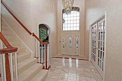 FOYER - Stunning two story foyer with gleaming til
