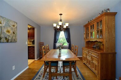 Formal dining room with hardwood floor and updated