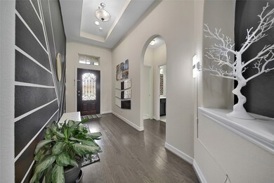 Entryway with custom paint and an art niche'