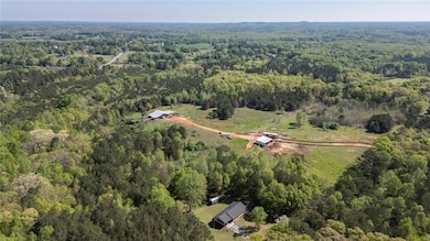 View of property location with a forest