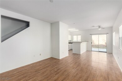 Unfurnished living room with visible vents, basebo