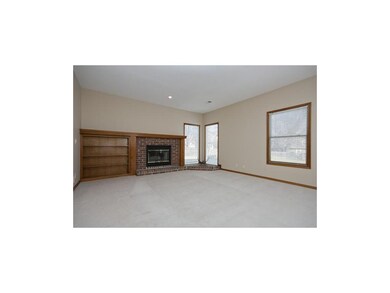Roomy great room features a fireplace with built-i