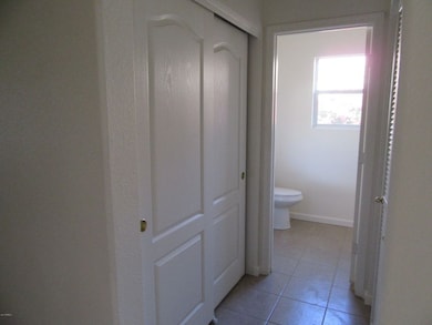 Storage Area Across from Washer & Dryer