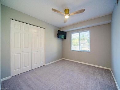 Unfurnished bedroom featuring carpet flooring, a c