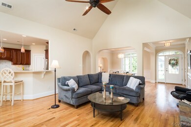Very open floor plan is perfect for entertaining- cathedral ceiling makes the family room feel even bigger.