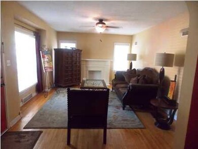 Living Room with decorative fireplace and lots of 