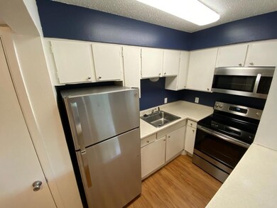 Kitchen featuring appliances with stainless steel