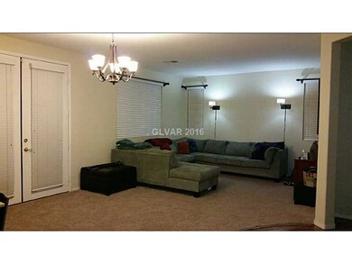 Property Photo. LARGE LIVING ROOM WITH FRENCH DOOR