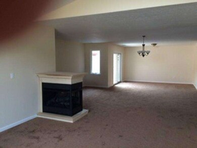 Den/Family/Great Room. Fireplace that serves both 