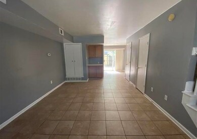 Unfurnished room with tile patterned flooring