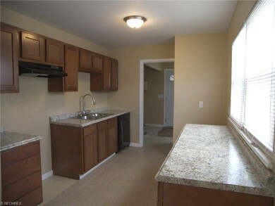 Brand new kitchen with ceramic flooring
