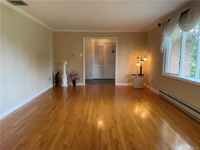 LR with HW floors & bay window, flows into dining 