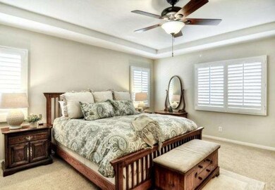 Master Suite details include Coffer Ceiling, Plantation Shutters, His and Hers closets, Granite and Ceramic Tile Bath and a Large Relaxing Soaking Tub. All bedrooms feature Ceiling Fans and Plantation Shutters