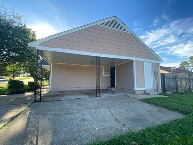 Exterior space with a carport