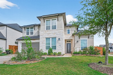 This is a modern two-story home featuring a mix of stone and stucco exterior. It has large windows, a well-maintained garden, and a spacious driveway leading to a garage. The house is situated on a corner lot with a neat lawn and mature trees.
