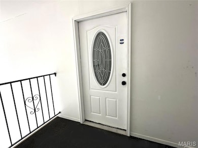 Beautiful front door with oval light...