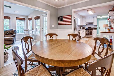 Dining room features bead board