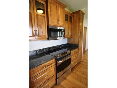 Remodeled Walnut Custom-Made Kit Cabinetry w/grani