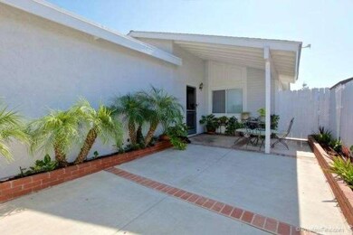 Large front patio with long planters for your gard