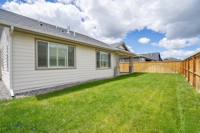 Fenced in yard with irrigation