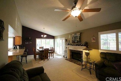 Living room with fireplace and custom mantle