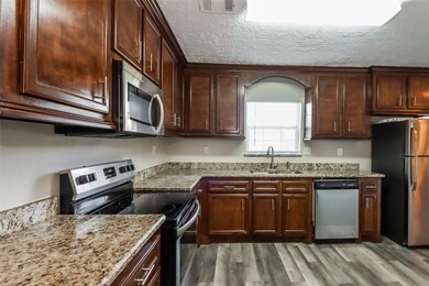 8219 Moon Beam St, Houston, TX 77088 - photo 5