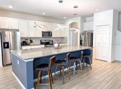 6004 Oak Green Loop, Davenport, FL 33837 - photo 6