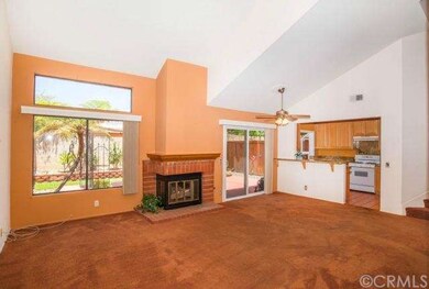 Large light and bright living room  with brick fir