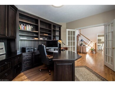 French doors lead from the foyer to the study