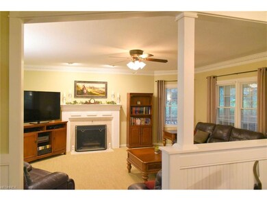 Open to the eat-in kitchen, this space is exemplar