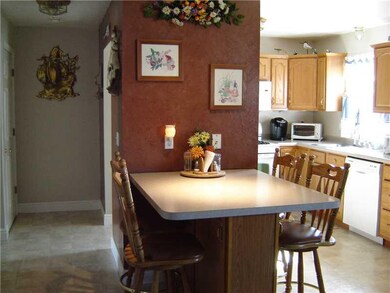 Kitchen. The peninsula is large enough to seat fou