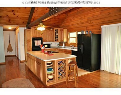 Kitchen. The kitchen features a over sized island