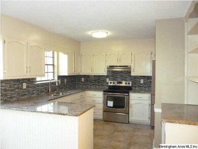Granite! Tile! Stainless appliances!
