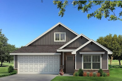Craftsman house featuring board and batten siding, concrete driveway, a front yard, an attached garage, and brick siding